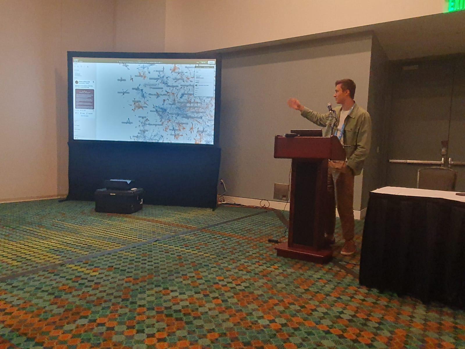 Brandon Duderstadt presenting on scaling dimensionality reduction with NOMAD projection
